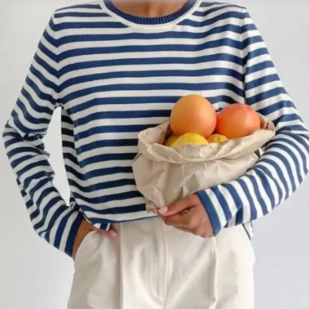 Autumnal knitted stripe jumper in a casual, relaxed style suitable for women during the autumn and winter seasons
