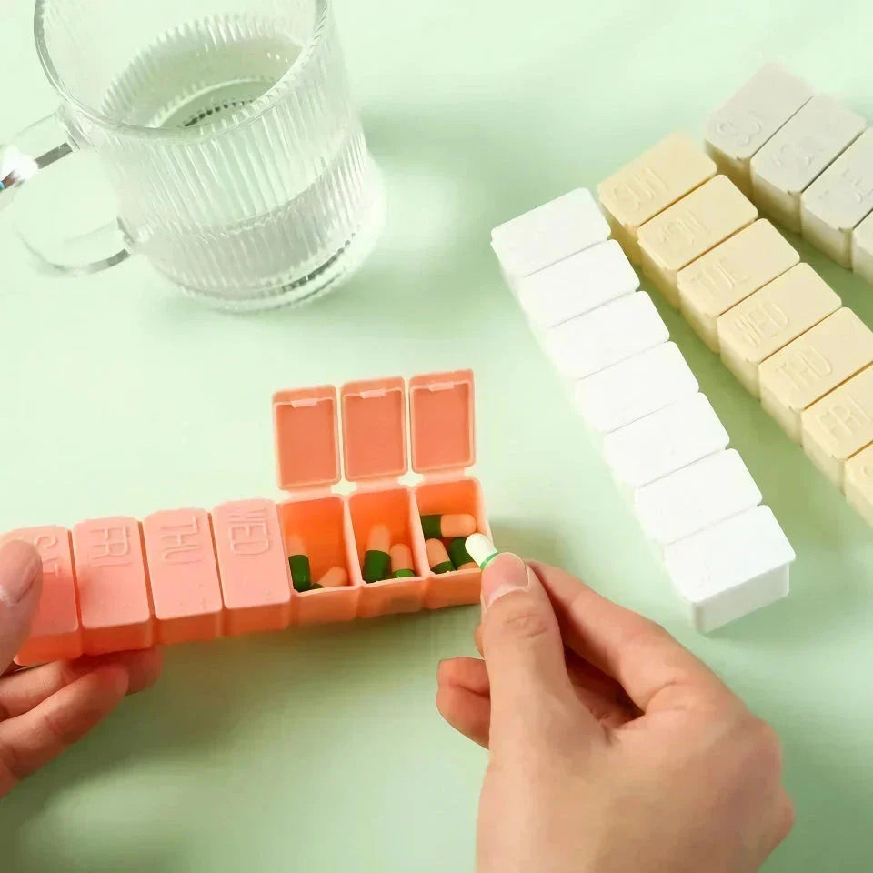 Colourful 7-day weekly pill organiser with clear compartments and lettering for easy medication management