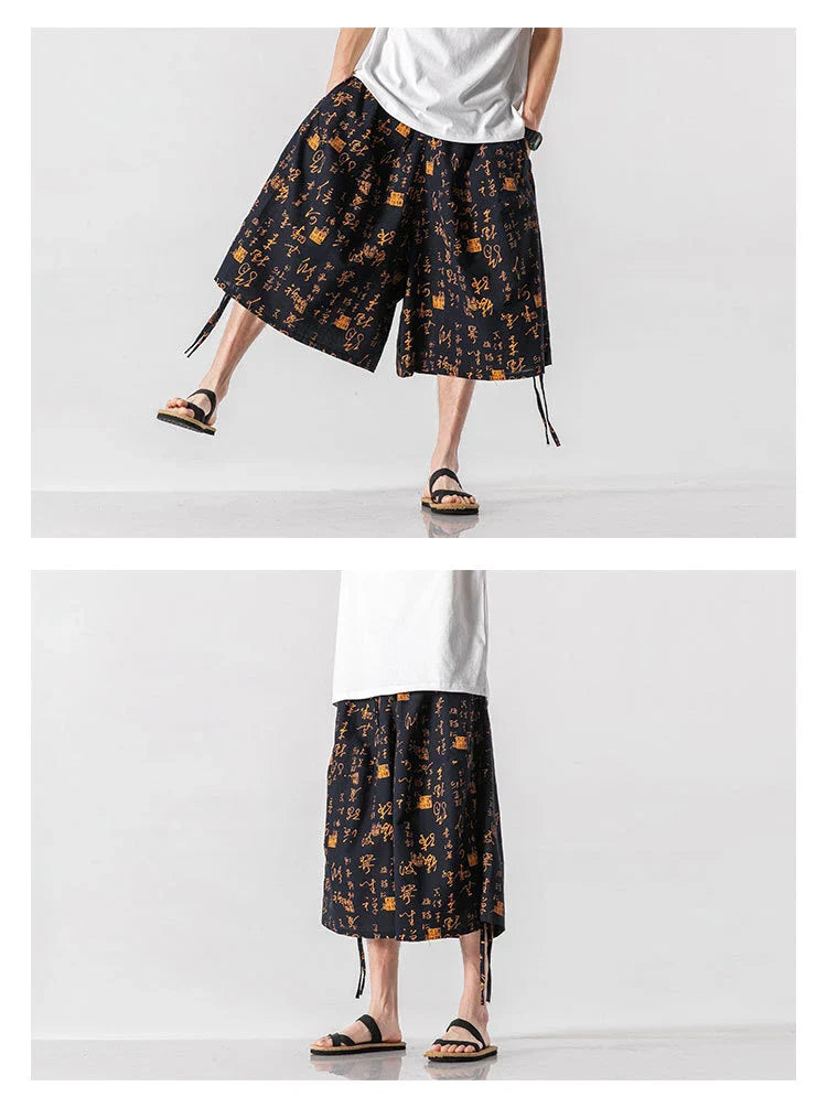 Men's loose-fitting Chinese-inspired cropped pants with a dragon or elephant floral pattern in navy blue, red, or coffee colours