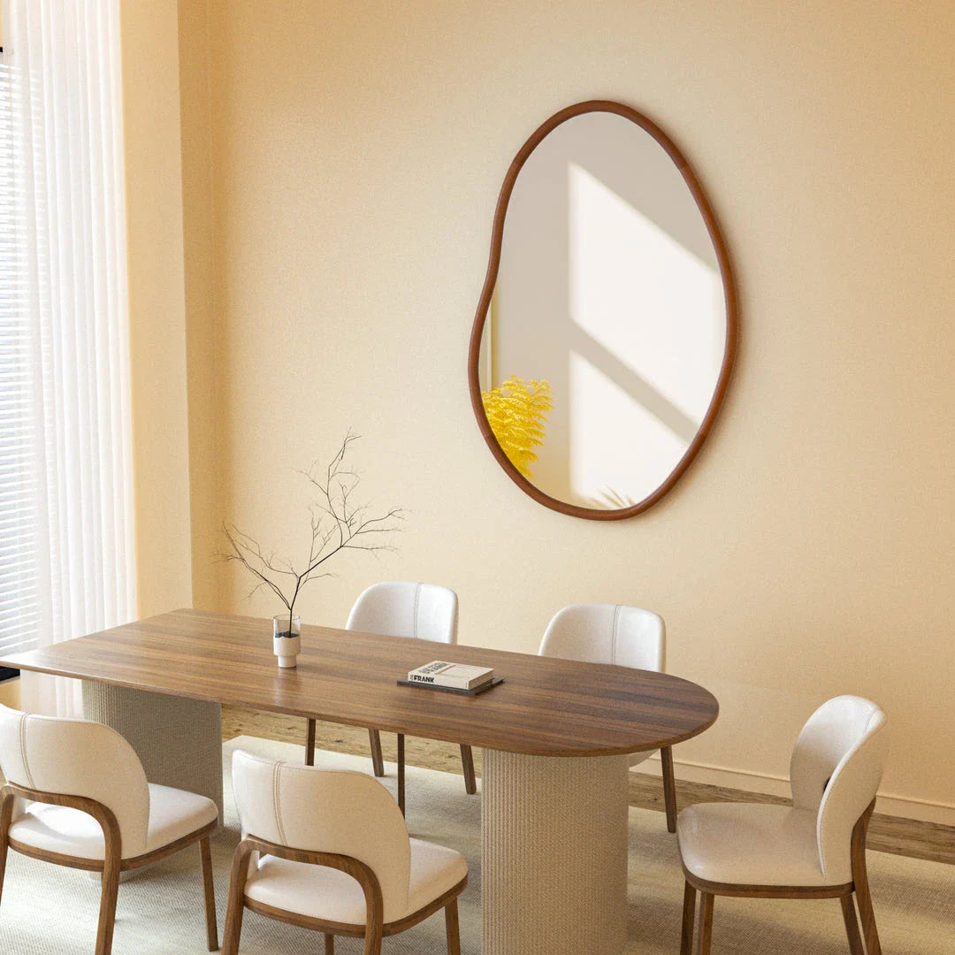 Stylish mid-century asymmetric decorative wall mirror with solid beech wood frame, adding visual interest and reflecting light to create a brighter, more open living space.