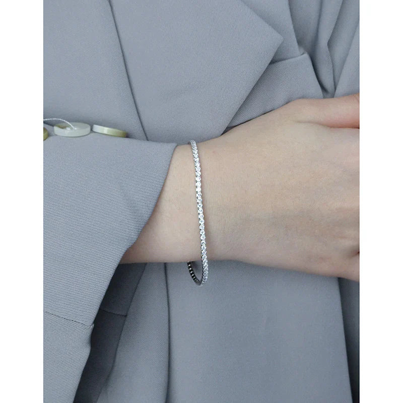 Sparkling silver geometric bracelet with adjustable clasp and intricate patterns