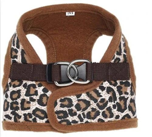 A stylish leopard-print dog harness made of durable polyester material for fashionable pups
