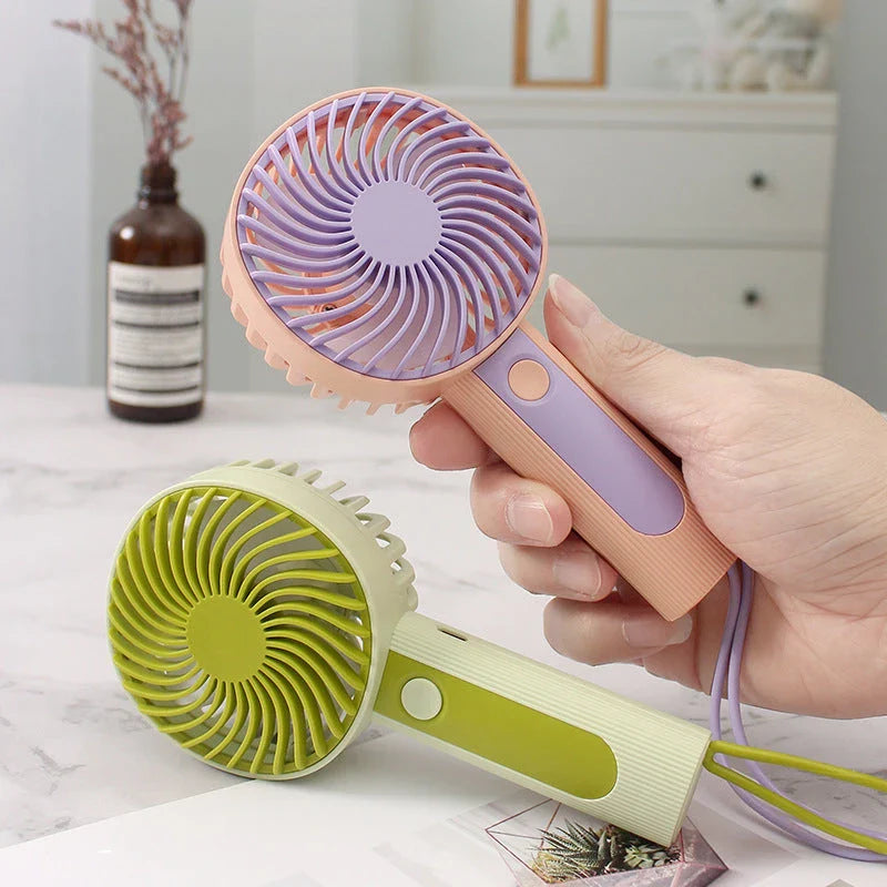 Mini Handheld USB Rechargeable Fan with 3 wind speed settings, rechargeable battery, and integrated night light