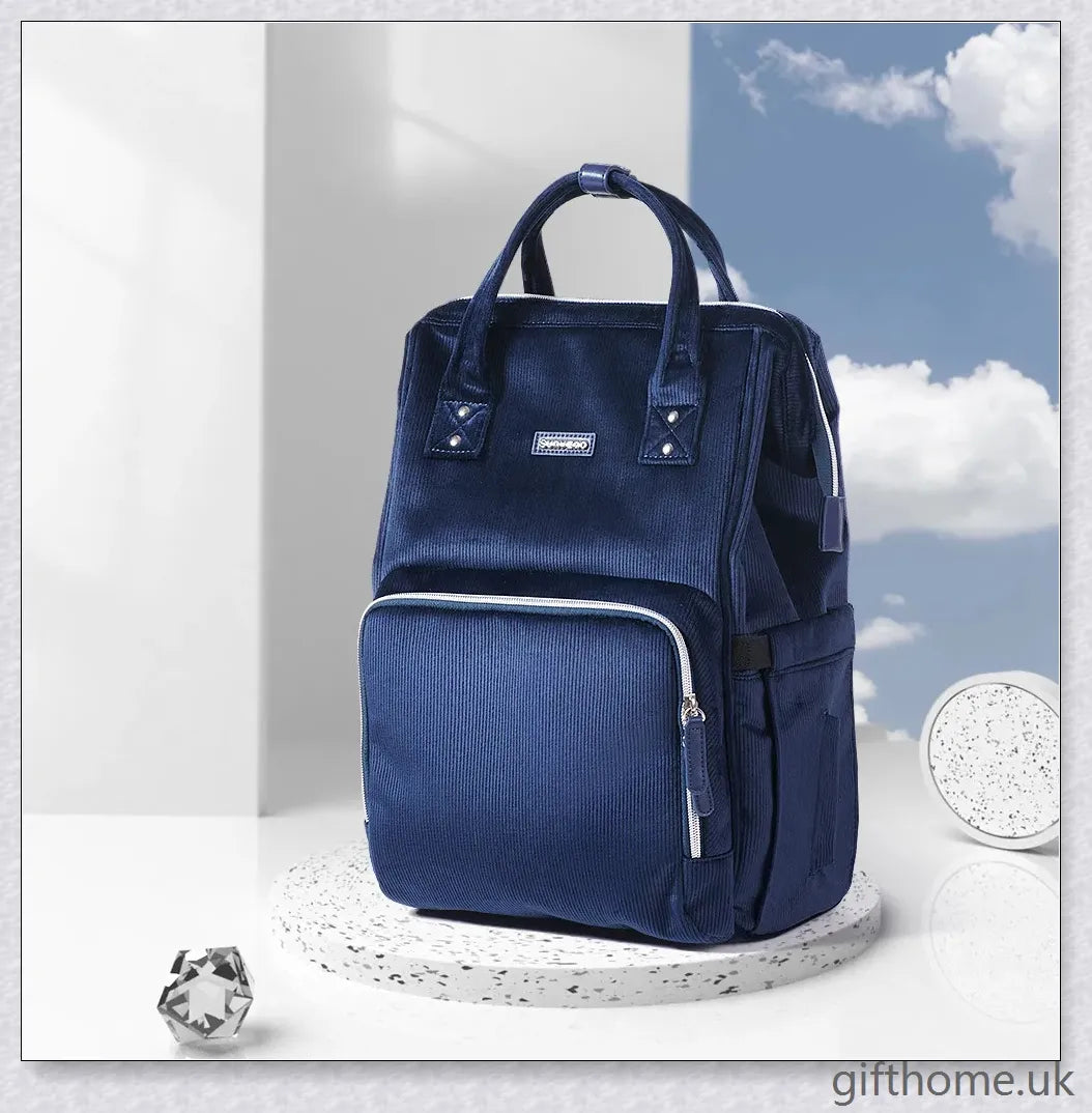 Premium polyester nappy backpack with multiple pockets and adjustable straps, perfect for modern British parents