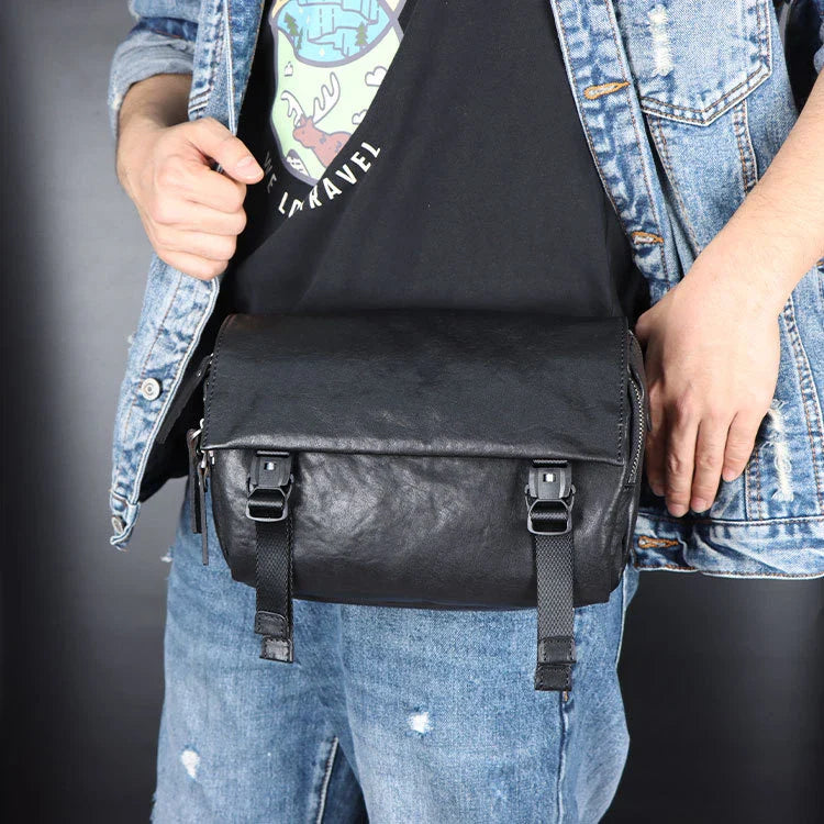 A stylish vegetable-tanned leather messenger bag for men, featuring a retro-inspired design and ample storage space.