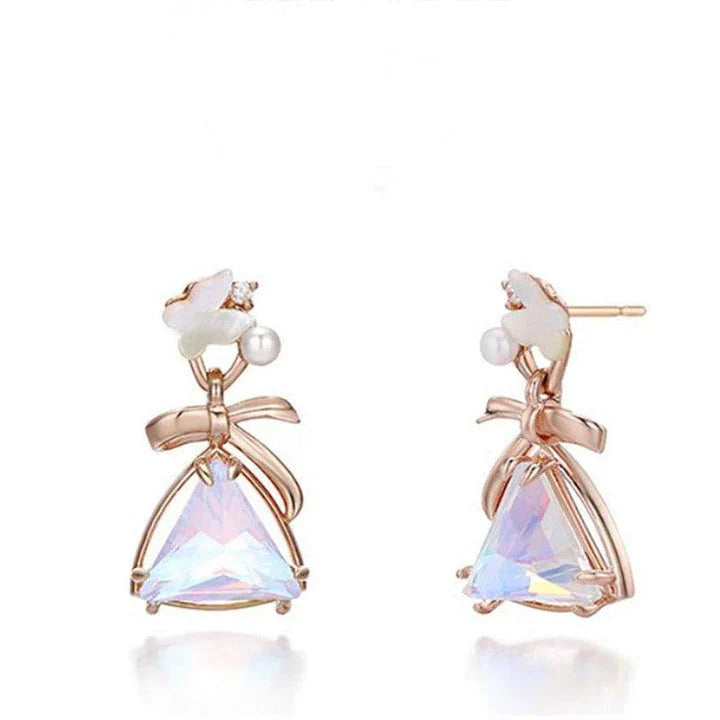 Elegant sterling silver butterfly earrings with a delicate and whimsical design, perfect for adding a touch of natural beauty to any outfit.