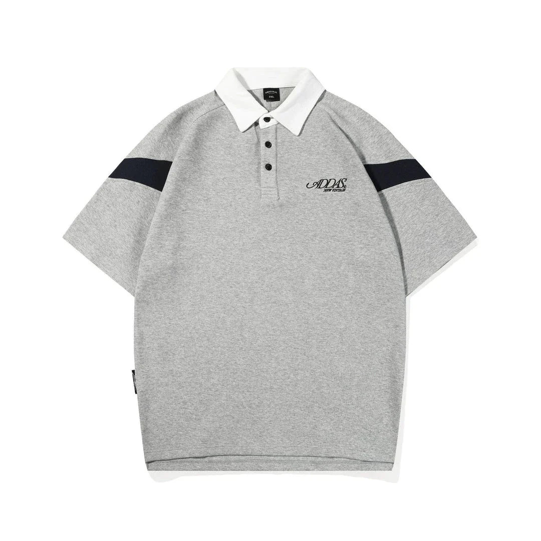 Melange grey polo shirt with contrast stitching, designed and made in Britain for comfortable summer wear