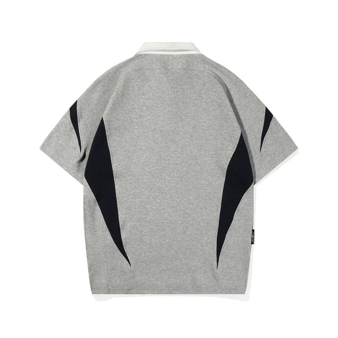 Melange grey polo shirt with contrast stitching, designed and made in Britain for comfortable summer wear