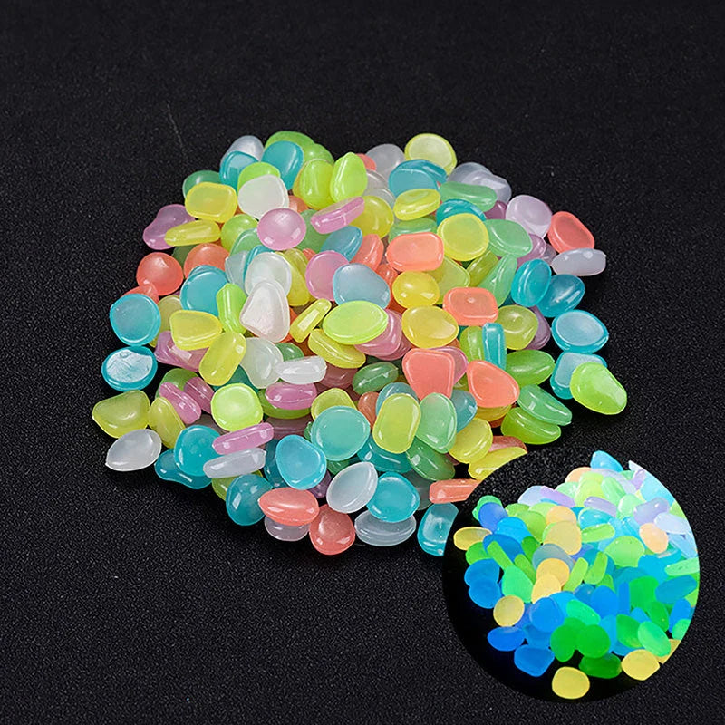 Enchanting glow-in-the-dark decorative pebbles illuminating a garden pathway at night