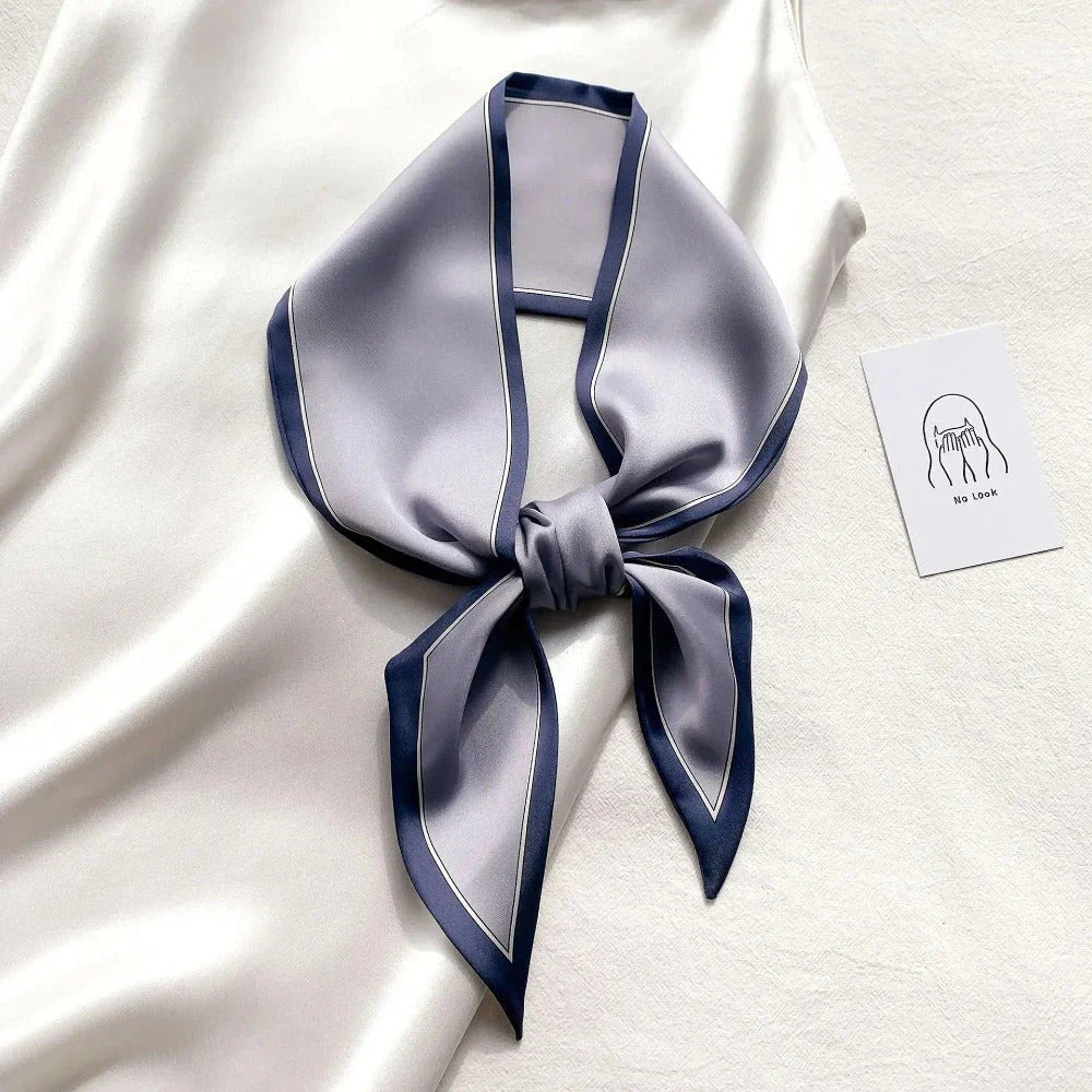 Luxury silk-feel narrow scarf in blue colour, a versatile fashion accessory for the modern British woman