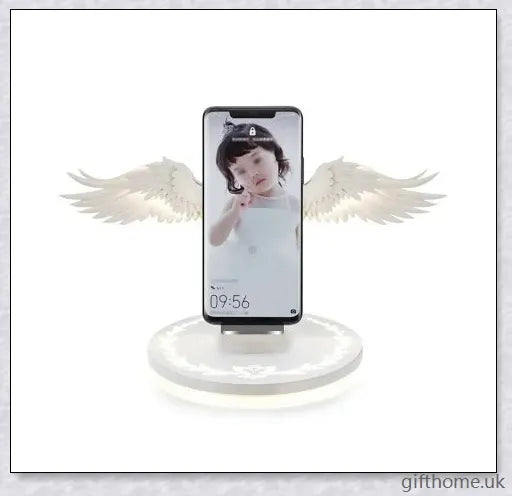 Elegant angel wings-shaped wireless charger with sleek, shiny surface and angelic lighting effect