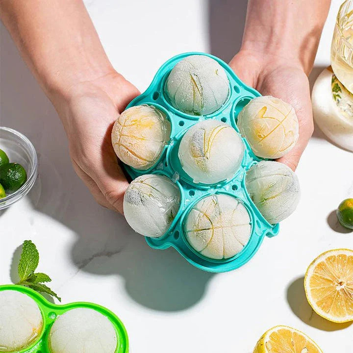 Spherical silicone ice mould with seven holes for creating perfectly round ice spheres to chill drinks