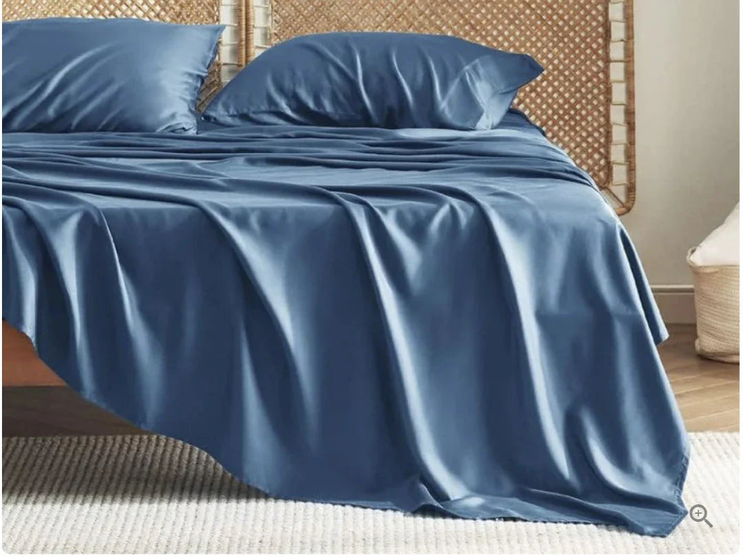 Bamboo fibre bedding set with fitted sheet, pillowcases, and solid colour design