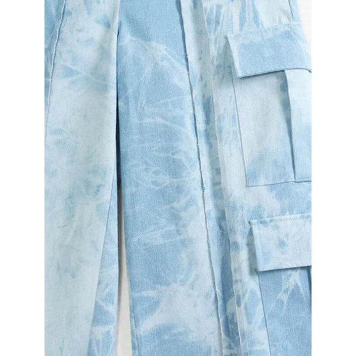 High-waisted tie-dye denim trousers with a straight-leg silhouette and practical pockets