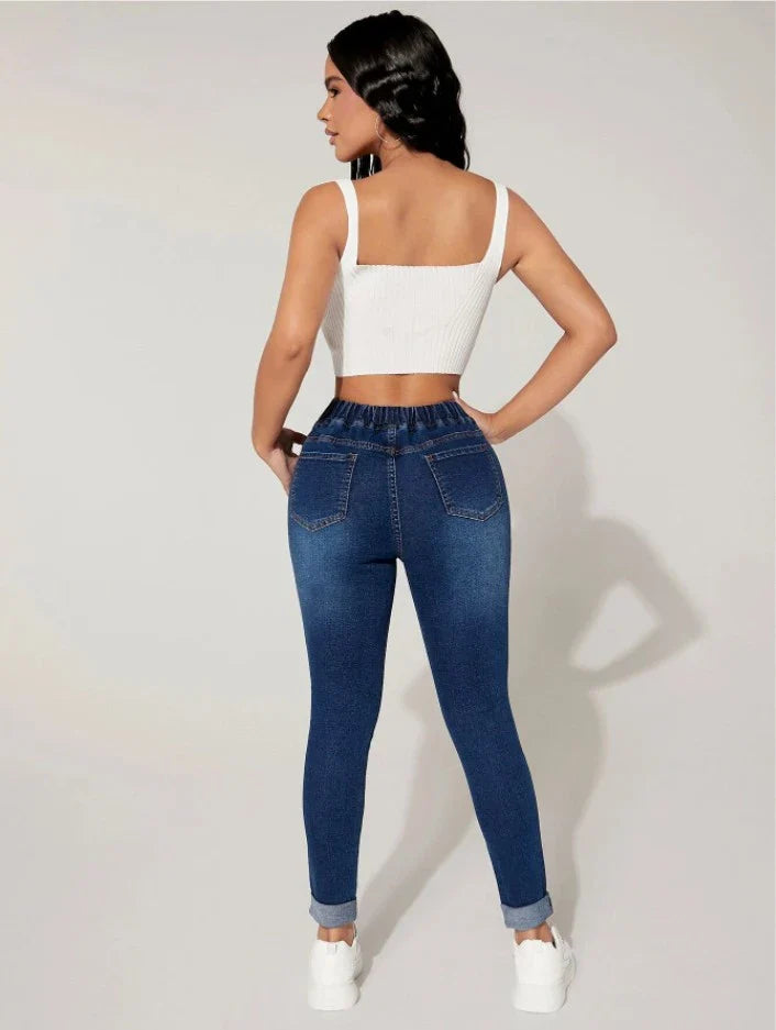 Premium navy blue drawstring waist skinny jeans with a vintage-inspired stone-washed finish