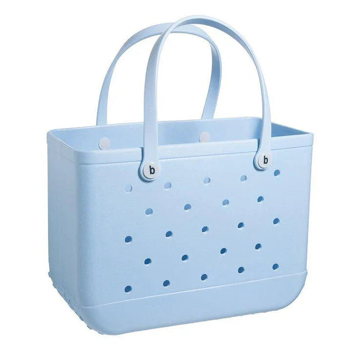 Premium waterproof beach tote bag in various vibrant colours, featuring spacious main compartment and multiple pockets for organised storage