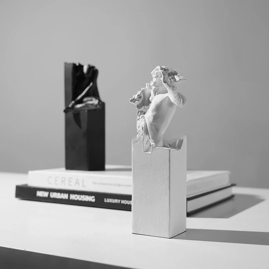 Elegant abstract sculpture in black and white, a minimalist desktop ornament that adds modern art decor to any space