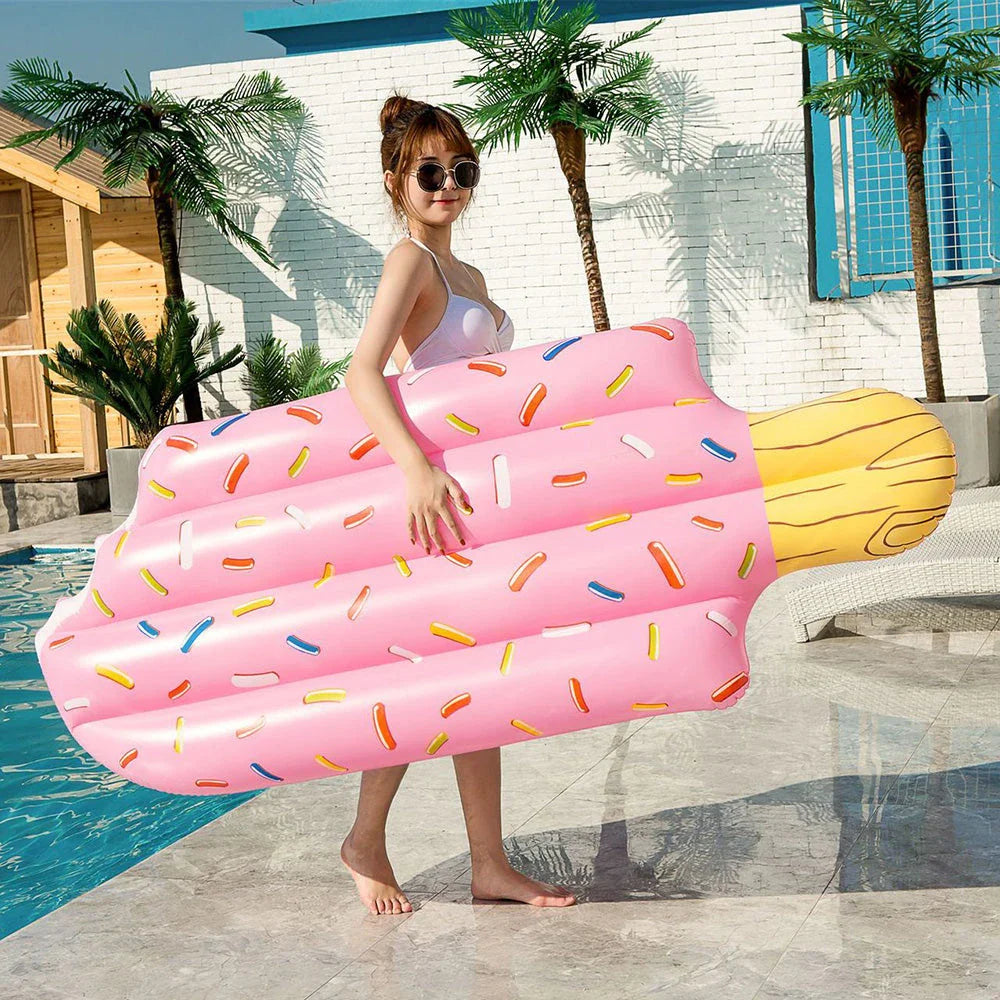 Premium inflatable swim float in a vibrant pink and blue ice cream design, providing comfortable and stylish relaxation on the water