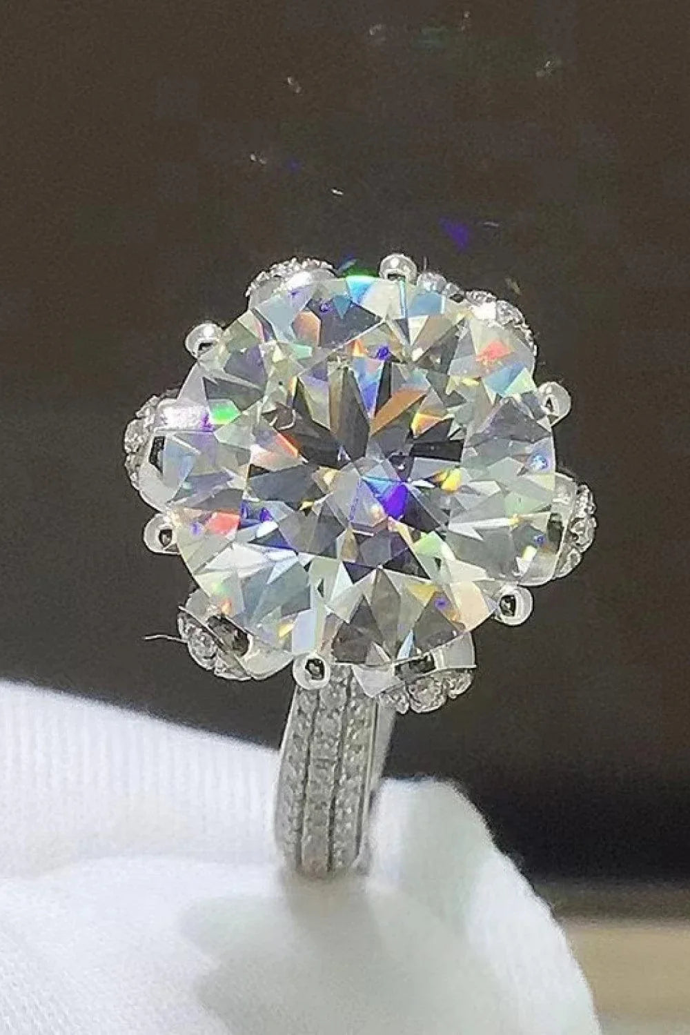 Exquisite 5-carat moissanite ring with zircon accents, crafted in 925 sterling silver with a sleek, modern design