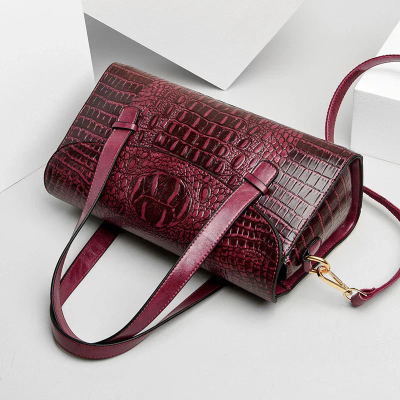 Premium crocodile pattern leather shoulder bag in multiple colours, featuring a pillow-shaped design for comfortable carrying and multiple interior pockets for organisation.