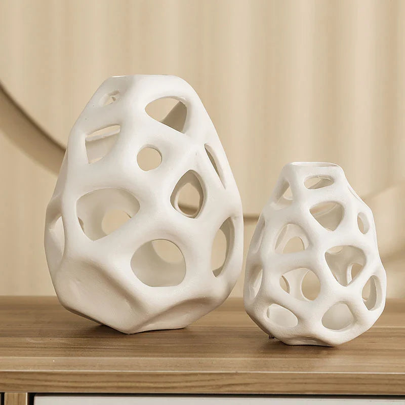 Stylish ceramic decorative balls in geometric design, available in white and black, small and large sizes, for modern home decor