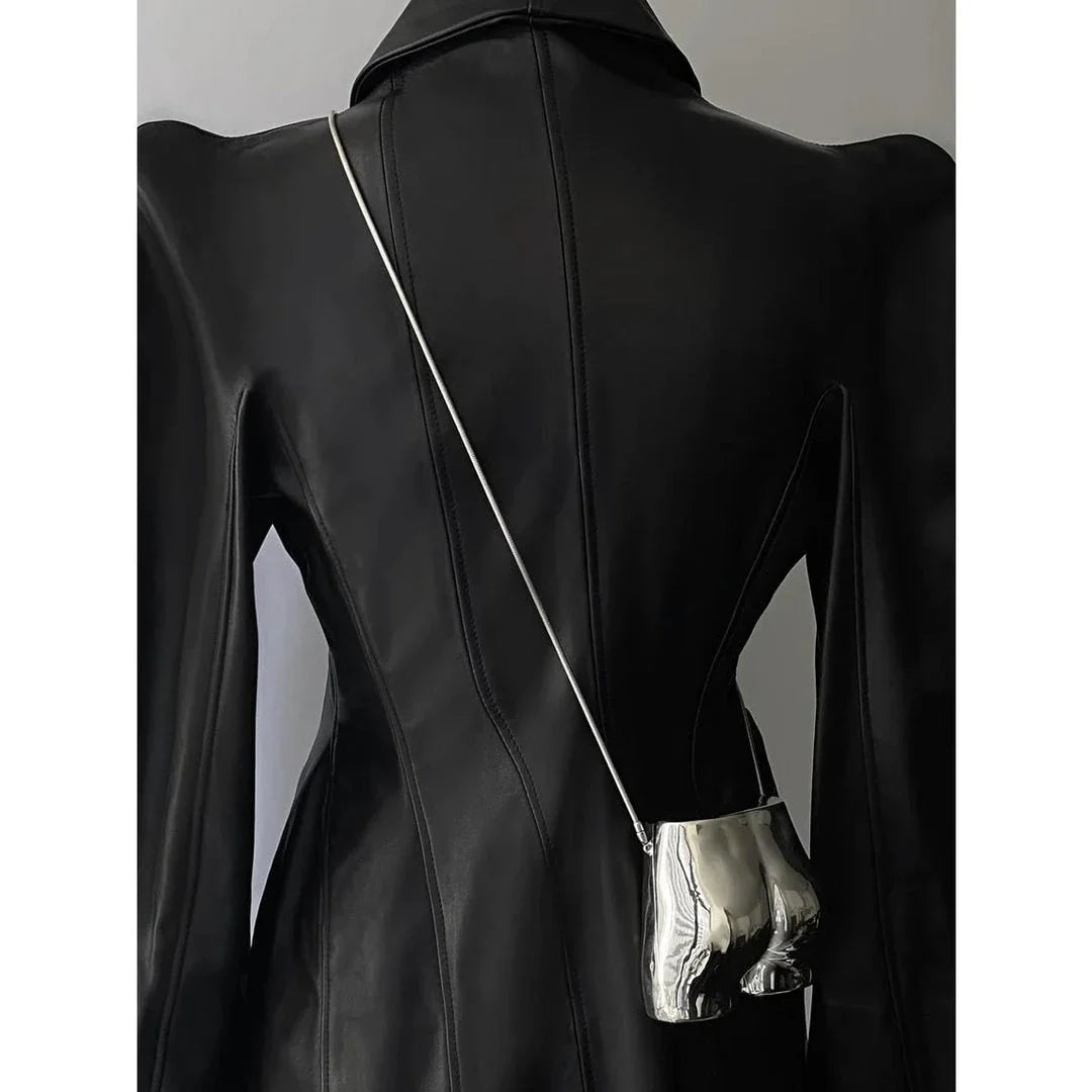 Elegant silver acrylic evening clutch bag with stylish chain strap for versatile carrying