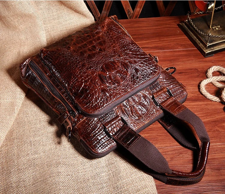 Premium brown leather commuting briefcase with vintage-inspired shoulder strap and textured leather button detailing