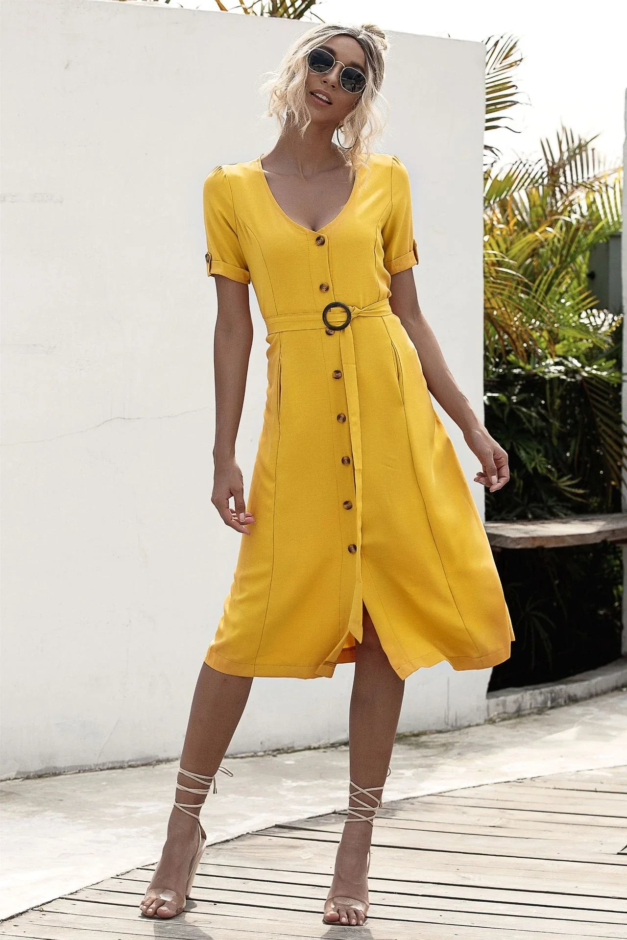 Stylish lace-up button dress in a soft, breathable cotton-blend fabric with a flattering middle waist silhouette