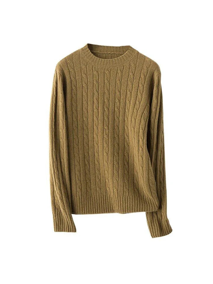 A luxurious 100% British wool cable knit jumper in a rich camel colour, perfect for keeping warm during the UK's chilly winters.