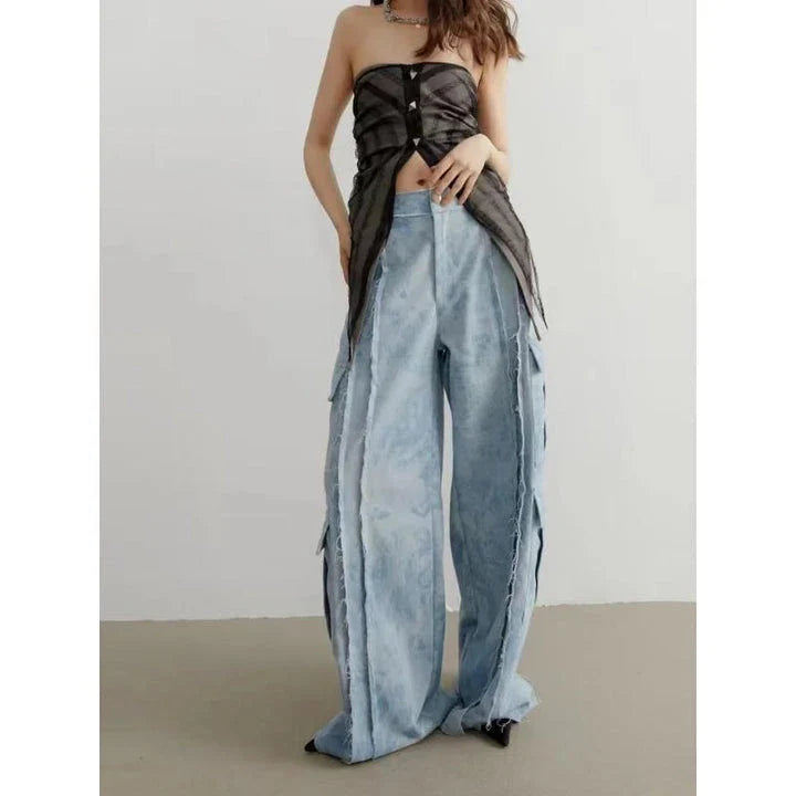 High-waisted tie-dye denim trousers with a straight-leg silhouette and practical pockets