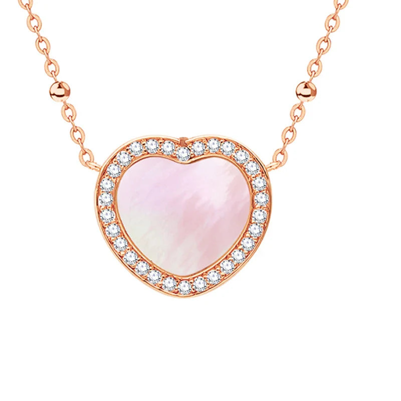 A rose gold or ice silver heart-shaped pendant necklace with an NFC chip for sending personalised digital messages