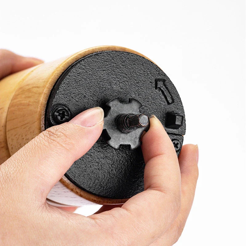 Elegant wooden manual coffee grinder with premium steel conical burr for consistent, flawless grinding