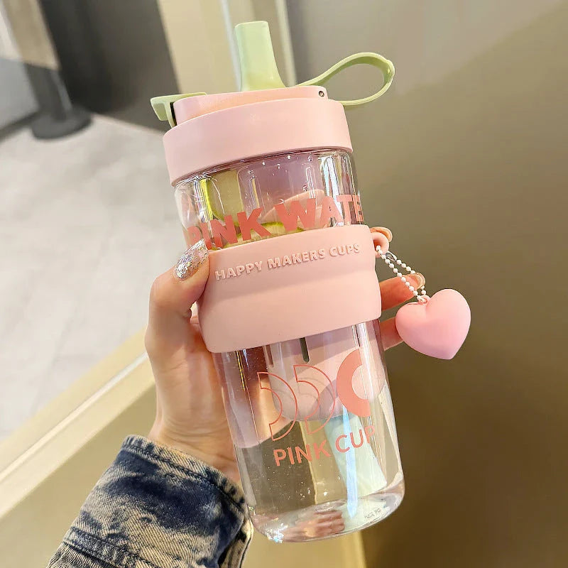 27oz water bottle with straw filter cover in pink, green, and blue colours for stylish hydration on the go