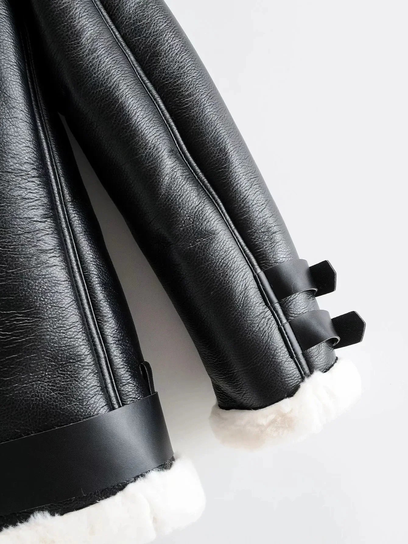 Warm faux leather jacket with plush faux fur lining, available in classic British colours for autumn and winter wear.