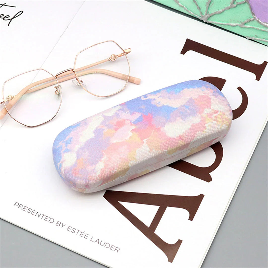 Gradient cloud printed eyewear case with metal frame and PU leather construction, protecting glasses from scratches and everyday wear and tear