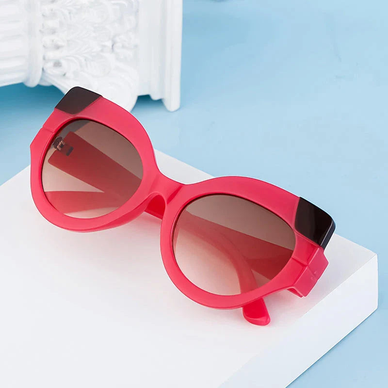 Iconic Cat Eye Retro Punk Sunglasses in black and gray, offering vintage charm and modern edge with UV400 protection
