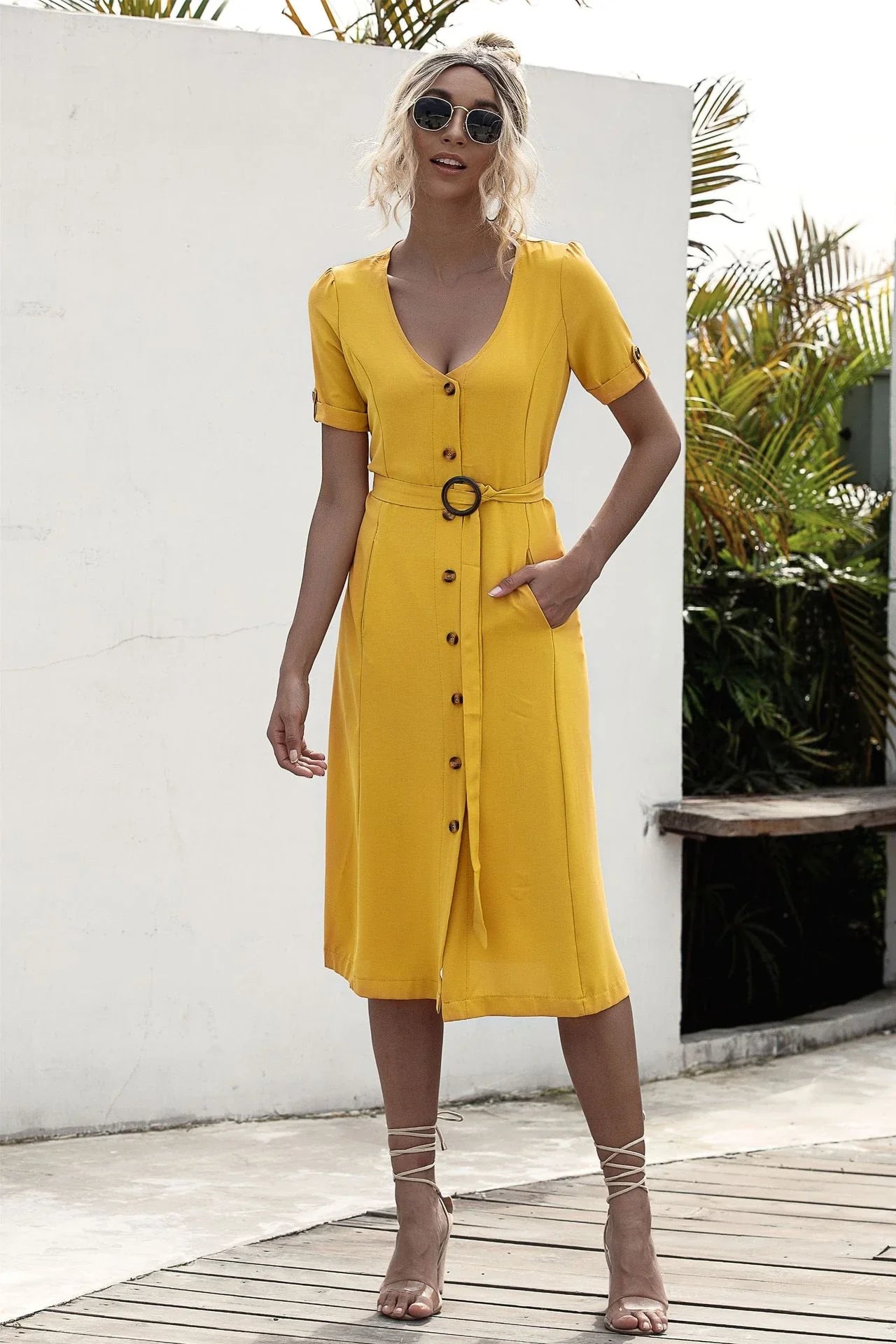 Stylish lace-up button dress in a soft, breathable cotton-blend fabric with a flattering middle waist silhouette