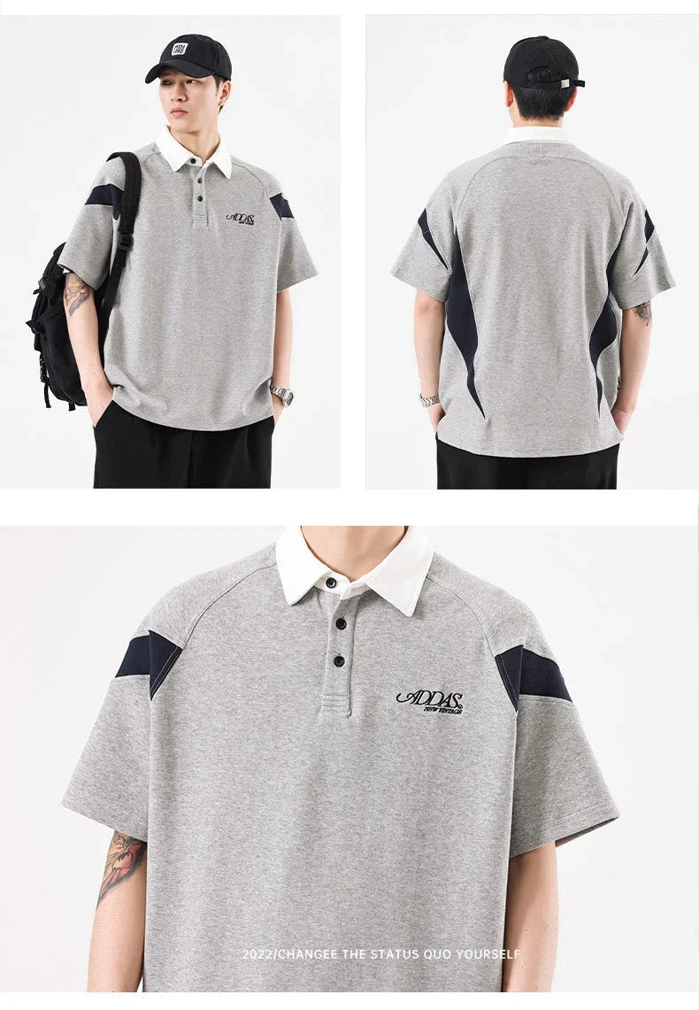 Melange grey polo shirt with contrast stitching, designed and made in Britain for comfortable summer wear