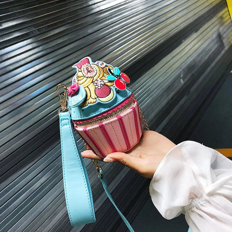 A stylish, ice cream-themed messenger bag with a vibrant print, durable PU leather construction, and a versatile bucket-style design.