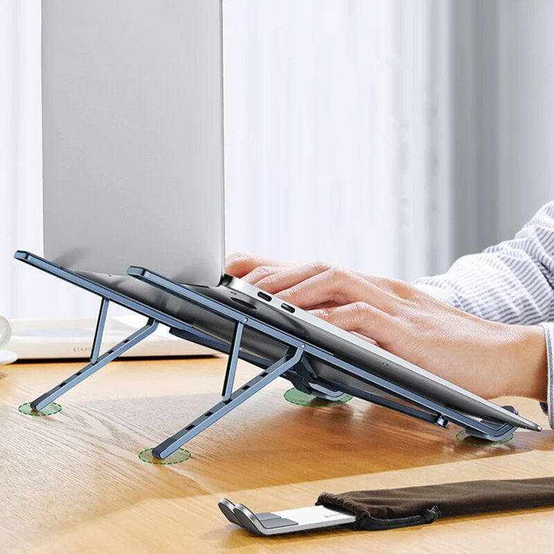 Adjustable and foldable aluminium laptop stand with 5 height levels, cooling design, and skidproof silicone platform