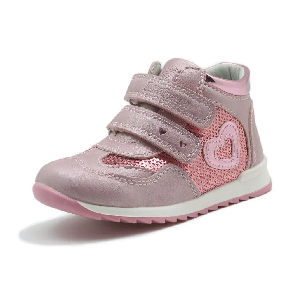 Charming dinosaur-themed girls' shoes in pink, peach, and grey colours with a comfortable and supportive design