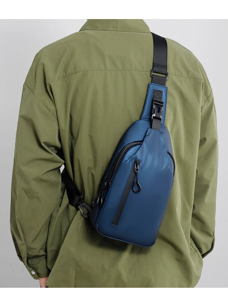 Versatile blue sling crossbody backpack for men with adjustable strap and spacious interior