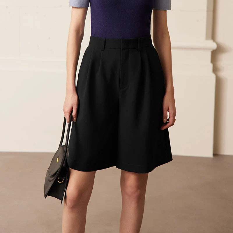 Elegant wide-leg shirred shorts for women, featuring a refined design and comfortable fit for the British summer