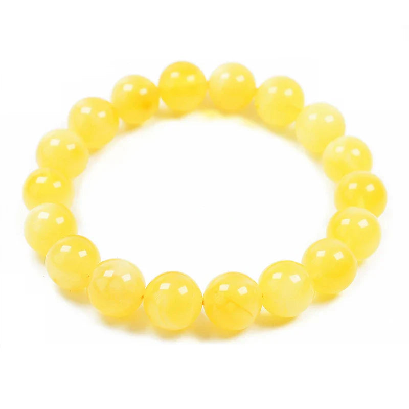 Elegant beeswax bracelets in a range of sizes, showcasing the natural beauty and premium craftsmanship of these premium Russian-inspired accessories.