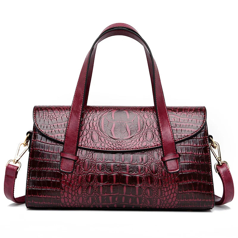 Premium crocodile pattern leather shoulder bag in multiple colours, featuring a pillow-shaped design for comfortable carrying and multiple interior pockets for organisation.
