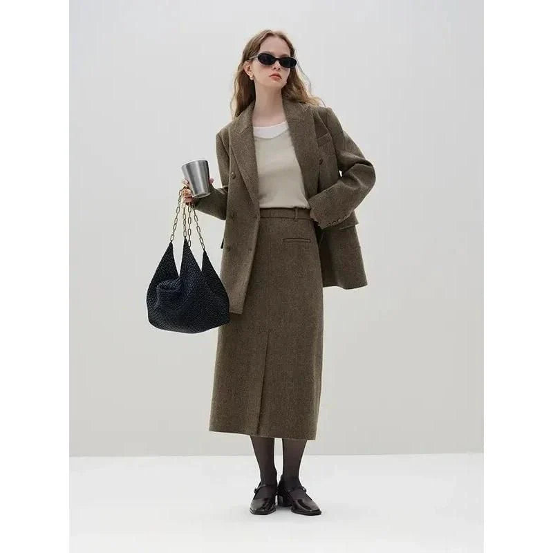 Sophisticated wool blazer and skirt set for professional women, featuring a chic double-breasted jacket and an elegant long skirt with a stylish front split