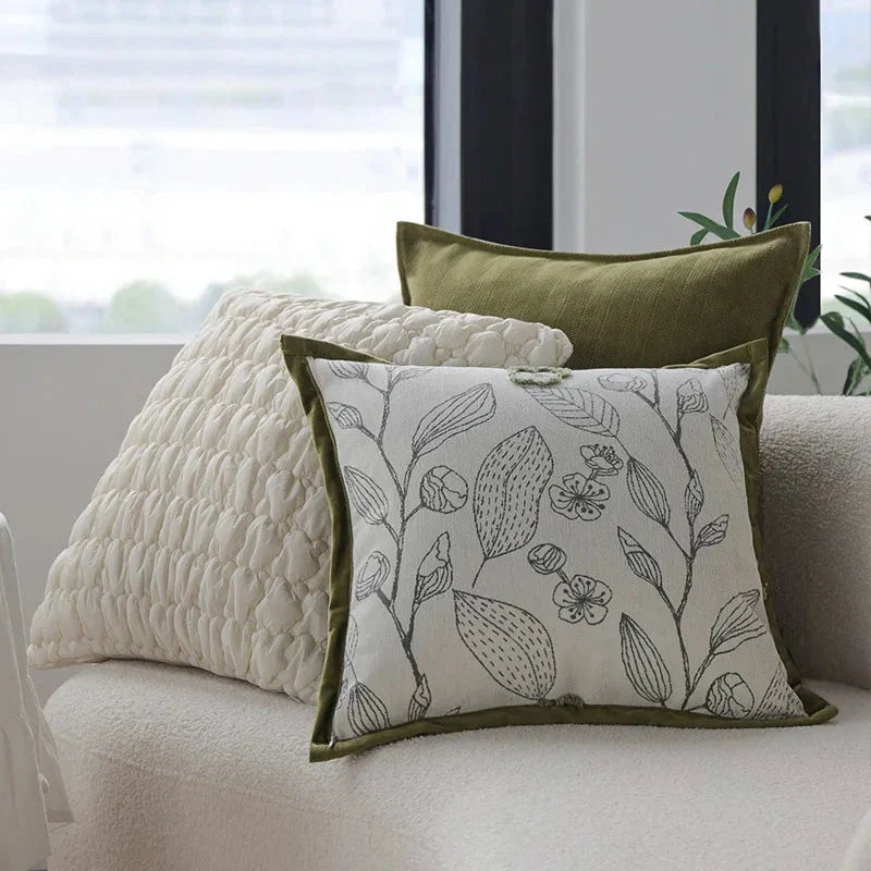 Luxurious cream and green jacquard cushion cover with a unique pattern, measuring 45 x 45 cm for a generous size and impactful presence.