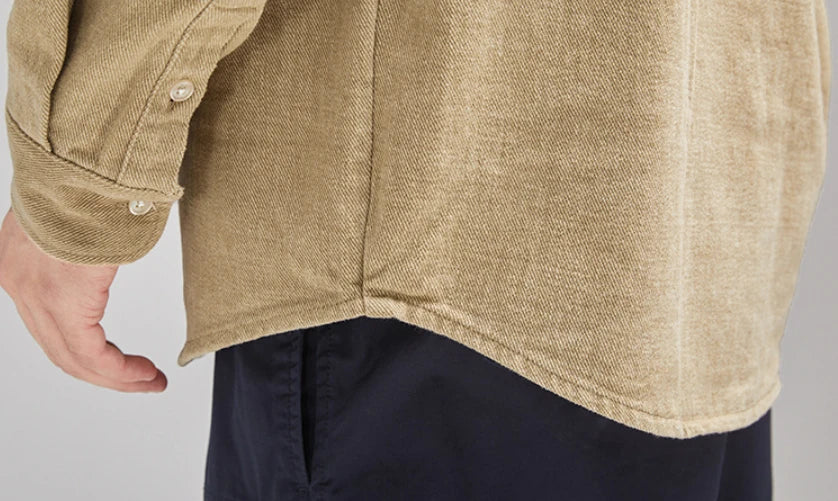 A relaxed, loose-fitting men's shirt in a retro-inspired design, crafted from premium cotton for exceptional comfort and style.