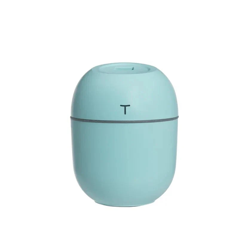 Compact ultrasonic humidifier and aroma diffuser with LED night lamp, available in white colour