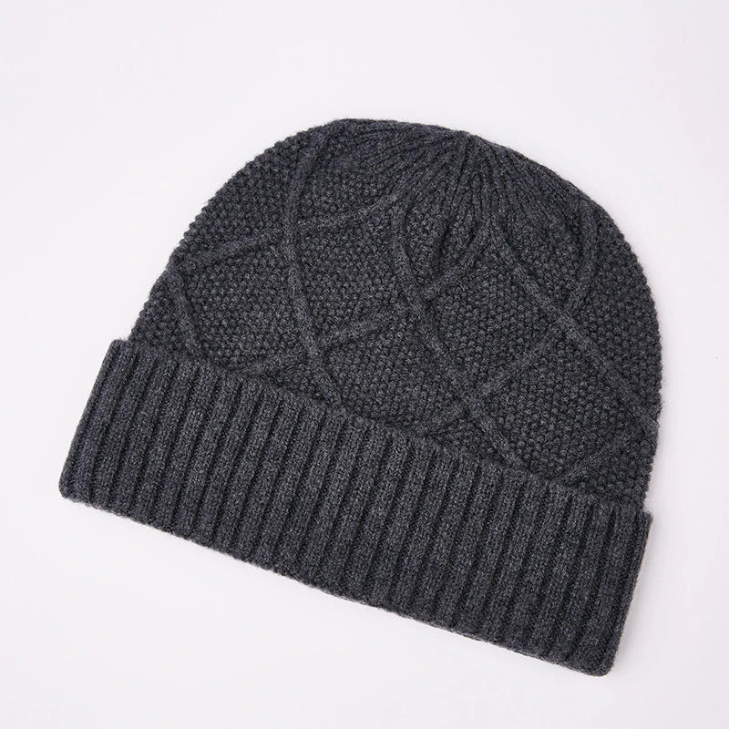 Premium knitted hat in various colours with a dome-shaped design, concave stripe pattern, and adjustable fit for warm outdoor fashion